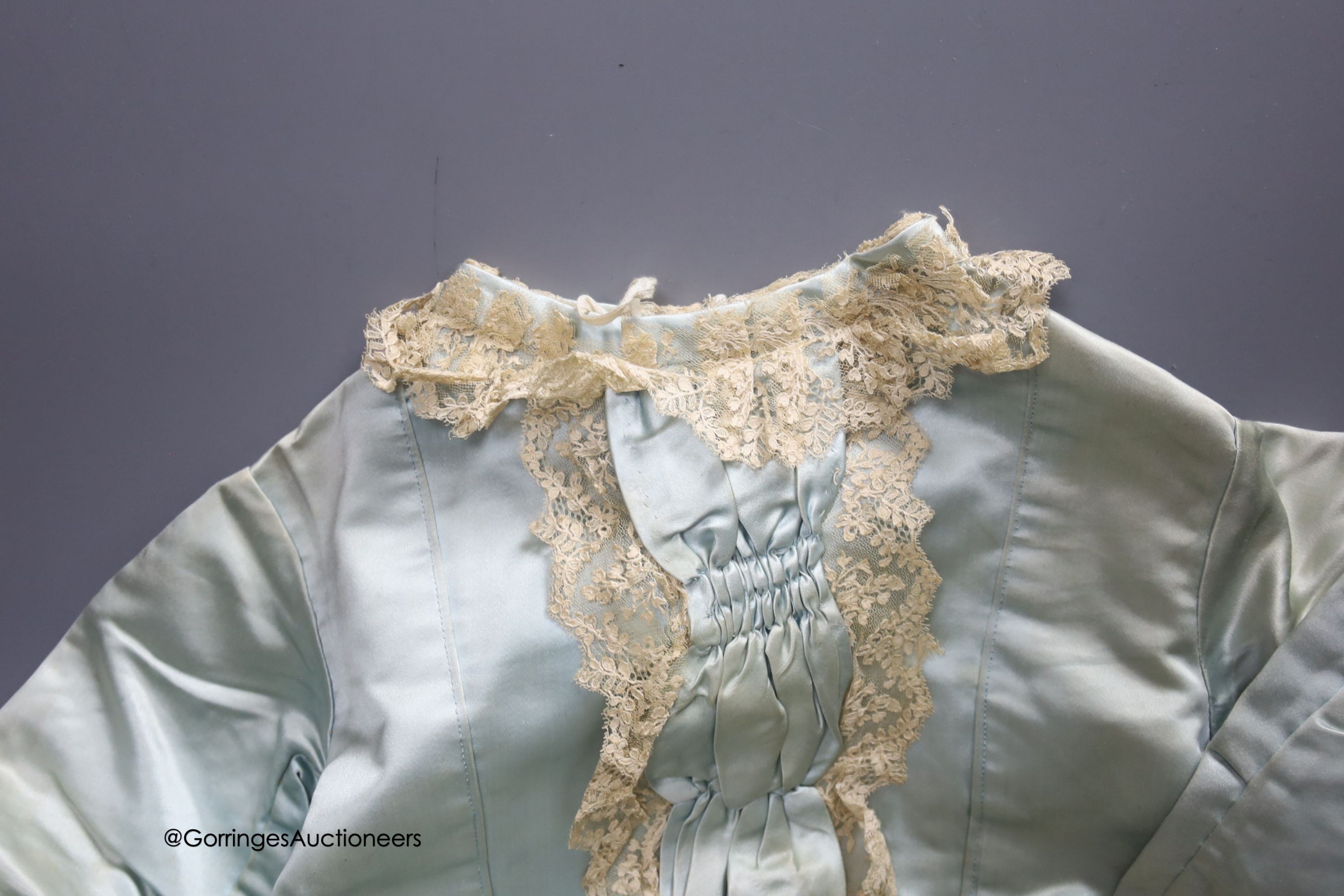 A Victorian silk and lace bordered dress